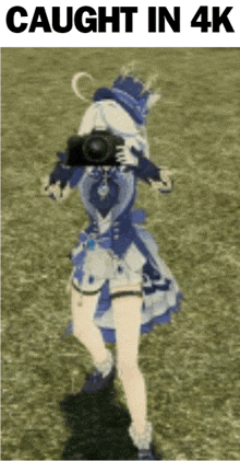 a girl in a blue dress is holding a camera in front of her face and says caught in 4k .