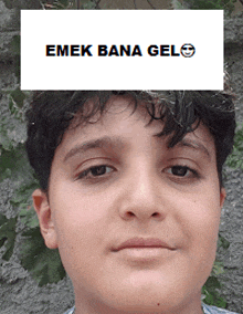 a boy with a sticker that says emek bana gel