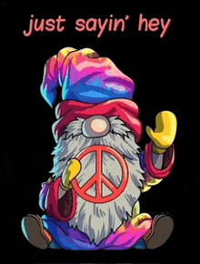 a gnome wearing a tie dye hat and a peace sign says just sayin ' hey .