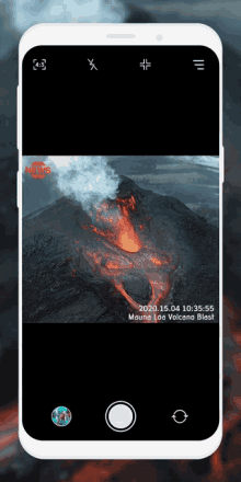 a phone screen shows a picture of a volcano with the time 10:35:55