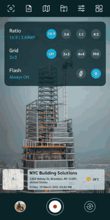 a phone screen shows a building under construction and the words nyc building solutions