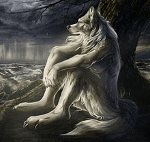 a white wolf is sitting under a tree looking at the ocean