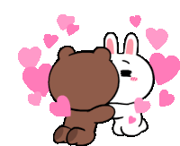 a brown bear and a white rabbit are hugging each other