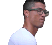 a man wearing glasses and a white shirt is looking to the side