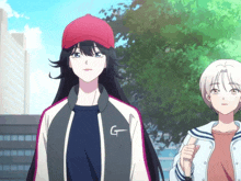 two anime girls are standing next to each other and one of them is wearing a hat with the letter g on it .