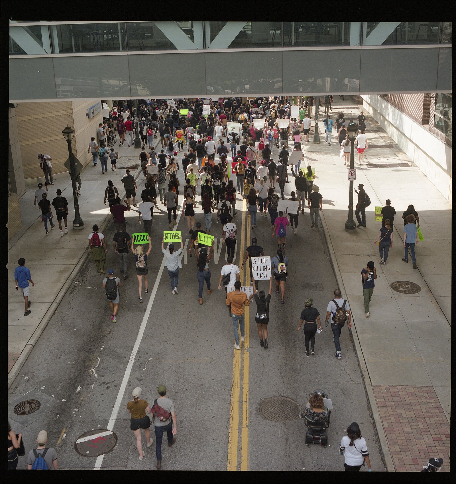 Image may contain Human Pedestrian Person Road Tarmac and Asphalt