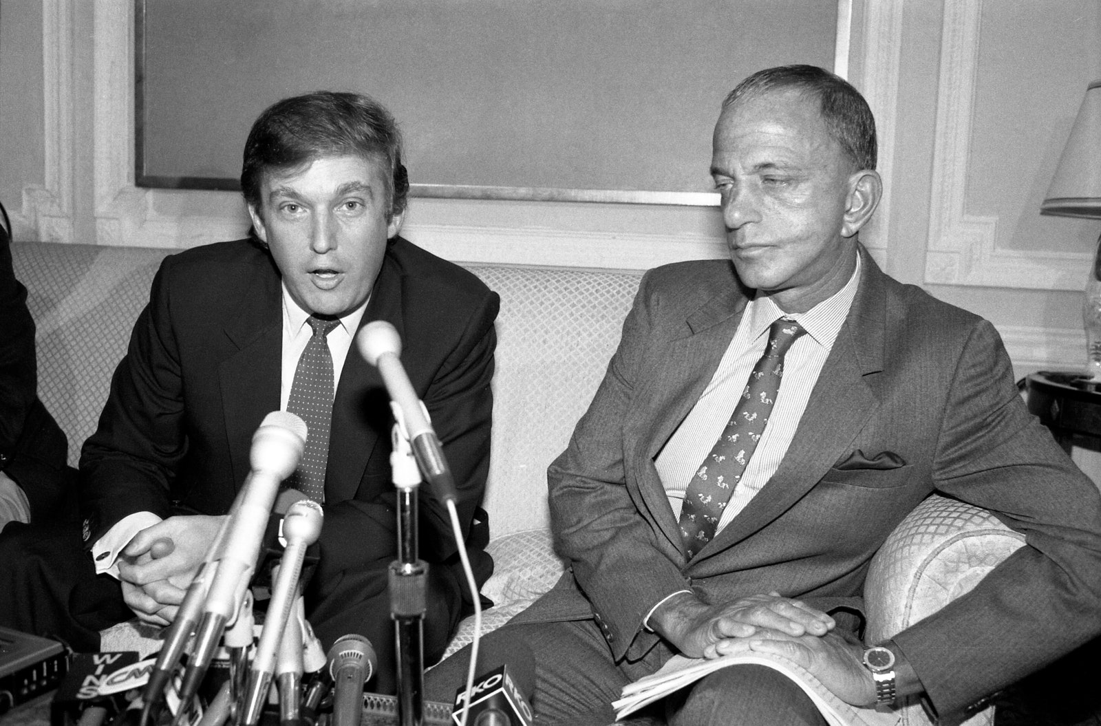 Image may contain Roy Cohn Donald Trump Crowd Person Press Conference Accessories Formal Wear and Tie