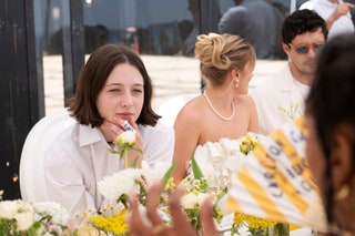 Image may contain Accessories Jewelry Necklace Flower Flower Arrangement Plant Adult Person and Glasses