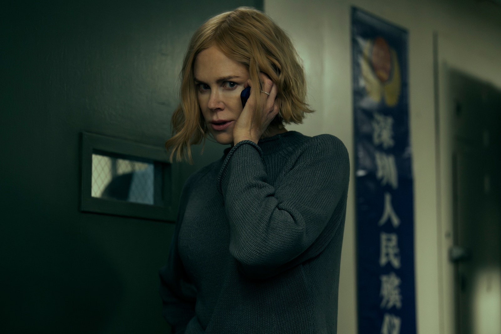 Image may contain Nicole Kidman Head Person Face Adult Sad Photography Portrait Crying and Electronics
