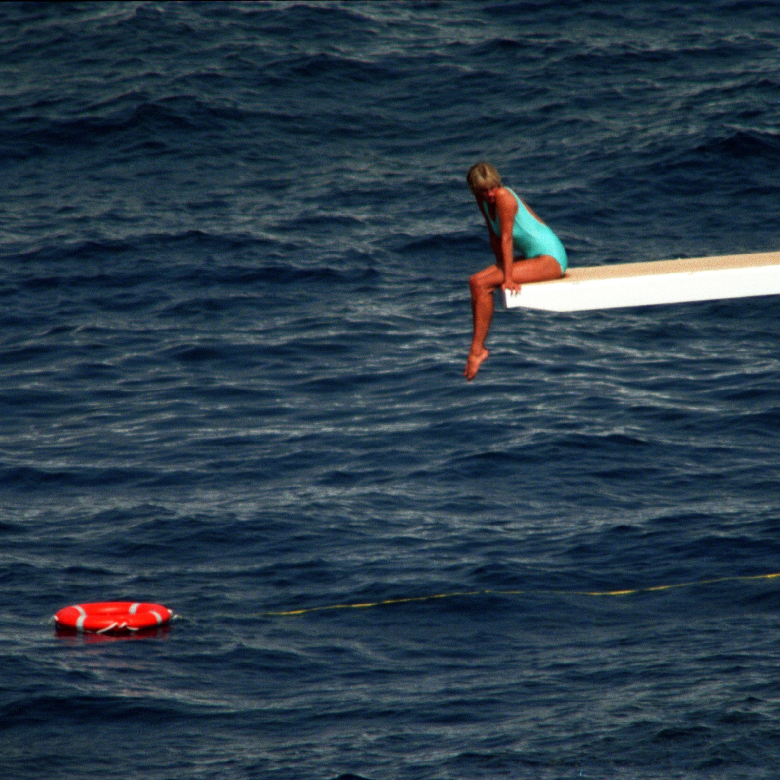 The Harrowing Symbolism Behind The Famous Diving Board Photo Of Princess Diana