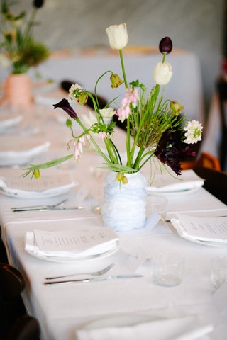 Image may contain Flower Flower Arrangement Plant Flower Bouquet Furniture Table Cutlery Fork Cup and Ikebana