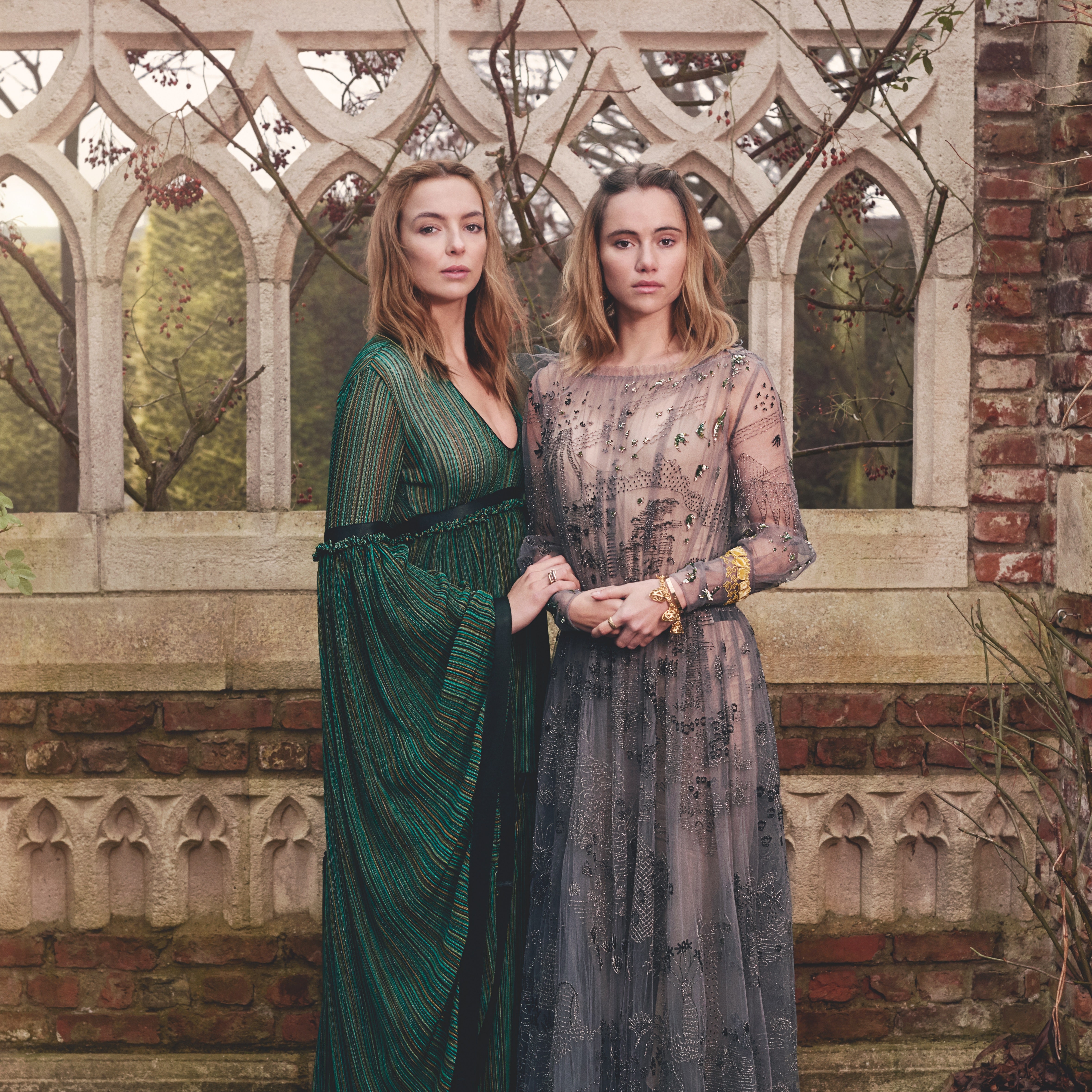 “Freezing Castles & Fitted Corsets”: When Vogue Dressed Period Drama Costars Suki Waterhouse & Jodie Comer In Tudor-Inspired Fashion