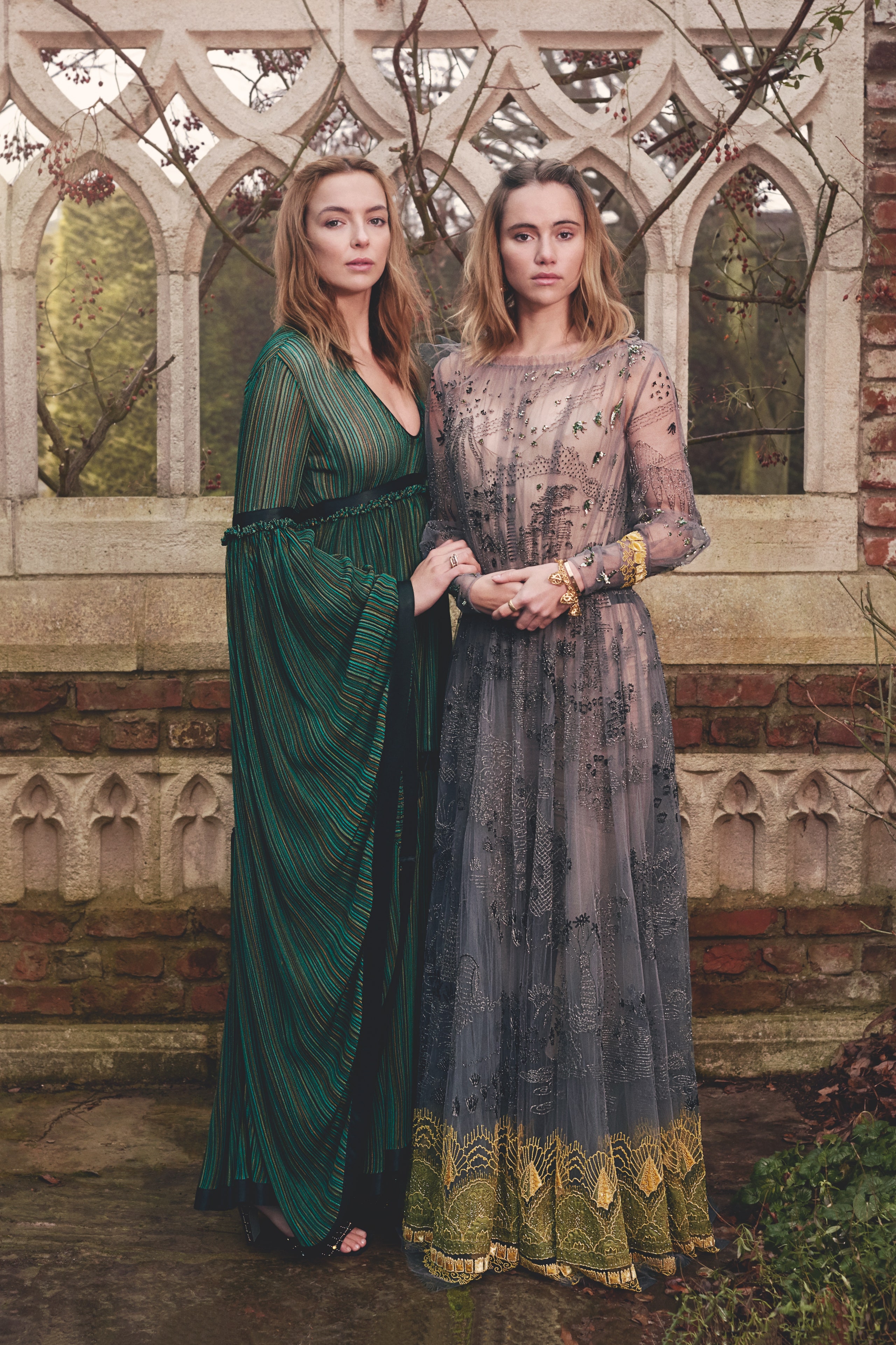 Image may contain Suki Waterhouse Jodie Comer Clothing Dress Adult Person Formal Wear Accessories and Bracelet