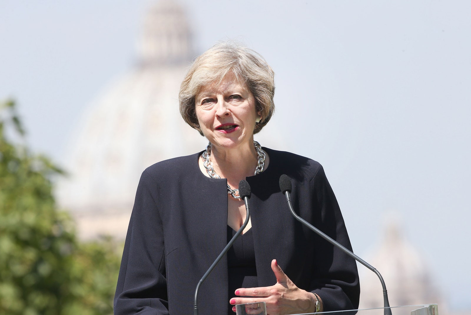 Image may contain Theresa May People Person Electrical Device Microphone Adult Crowd Photography and Accessories