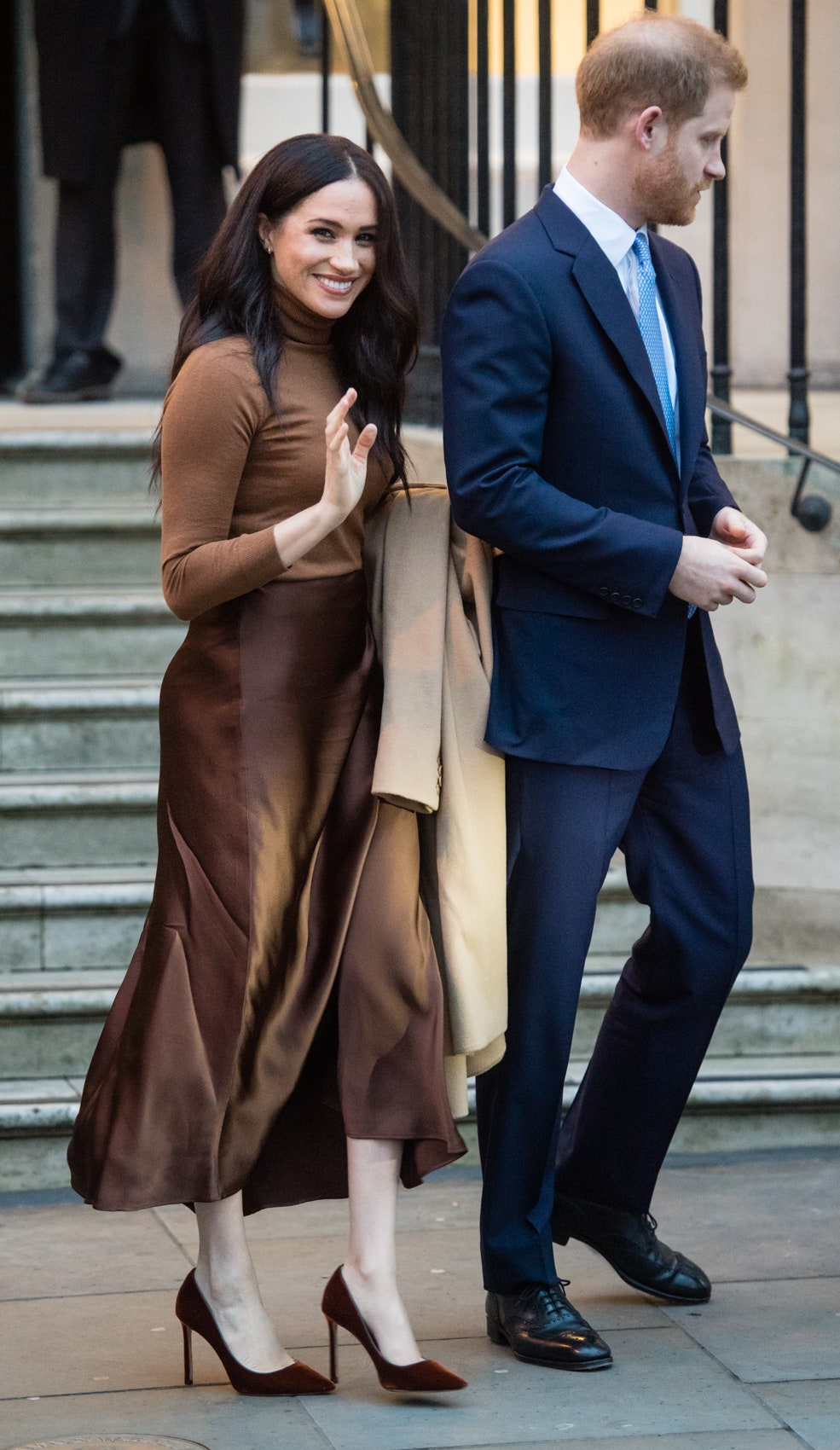 Meghan Markle wearing her Jimmy Choo Romy pumps in Oxid velvet.