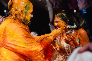 Image may contain Celebrating Person Adult Wedding Festival Holi and Baby