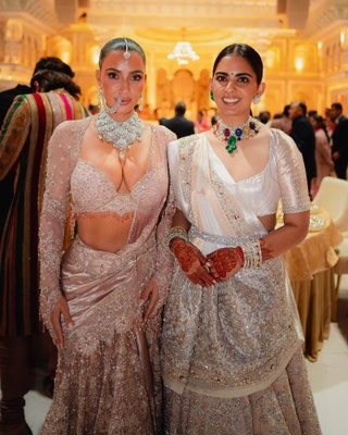 Image may contain Huda Kattan Isha M. Ambani Accessories Jewelry Necklace Adult Person Wedding Clothing and Dress