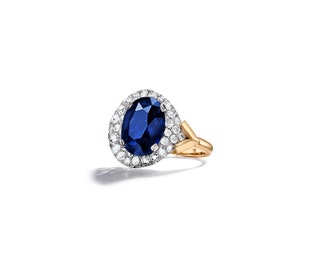 Platinum and yellow gold ring set with an oval sapphire over 12 carats and round diamonds Tiffany  Co