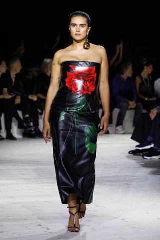 After longtime house model Naomi Campbell closed the show David Bowies “Heroes” filled the space in preparation for...