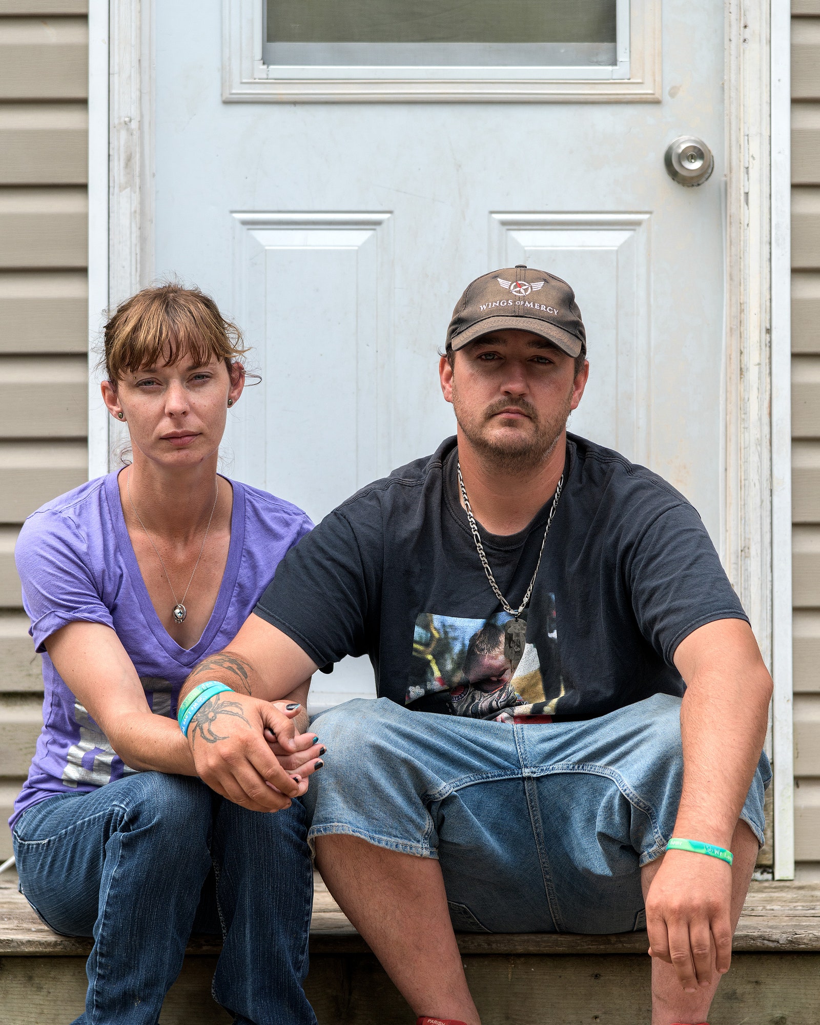 Ashley Brown and Jason Ehler on their back porch in Bible Hill.