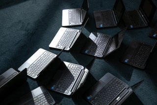 Chromebook laptops laid out on floor