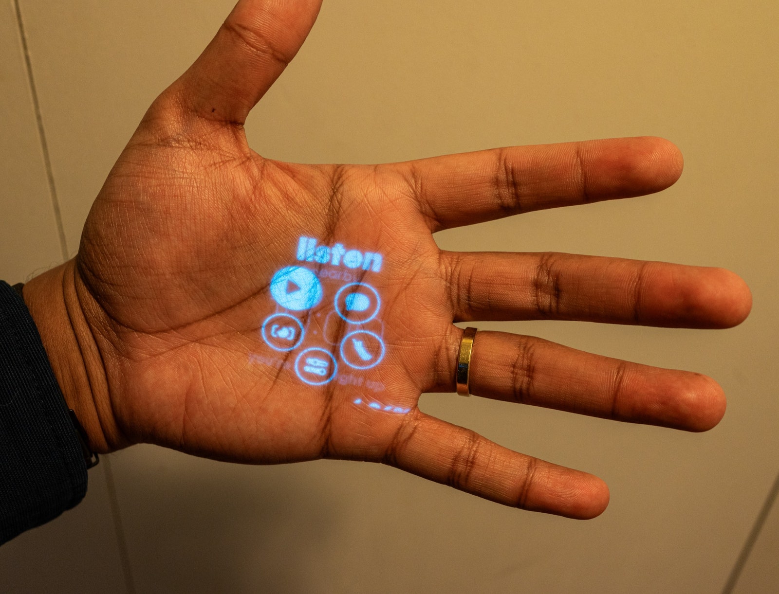 Humane Ai Pin projected text onto person's hand