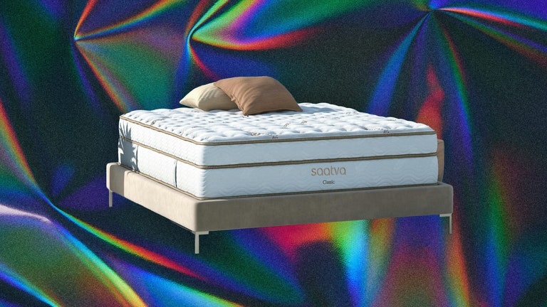 Thick mattress on minimalist wooden frame with 2 square pillows on top. Background iridescent foil texture.