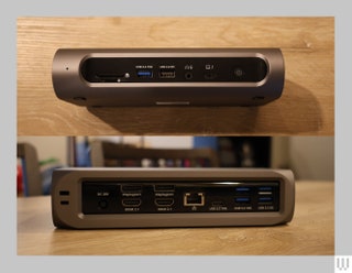 Front and back view of grey rectangular device with multiple ports