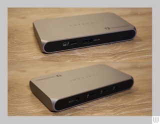 Front and back view of silver rectangular device with multiple ports