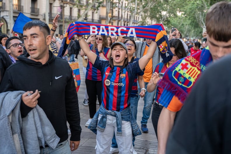 Dozens of FC Barcelona fans are celebrating the Women's Champions League at the Canaletas fountain after the Culers beat Olympique Lyonnais 2-0 at the San Mames stadium, in Barcelona, Spain, on May 25, 2024. (Photo by Marc Asensio/NurPhoto via Getty Image