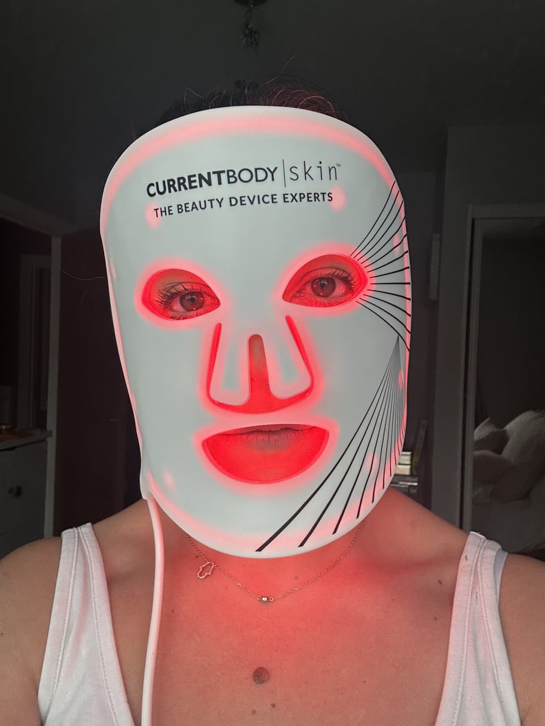 Woman wearing LED face Mask