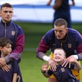 Why Football Teams Are Escorted Onto the Field by Kids Before a Match