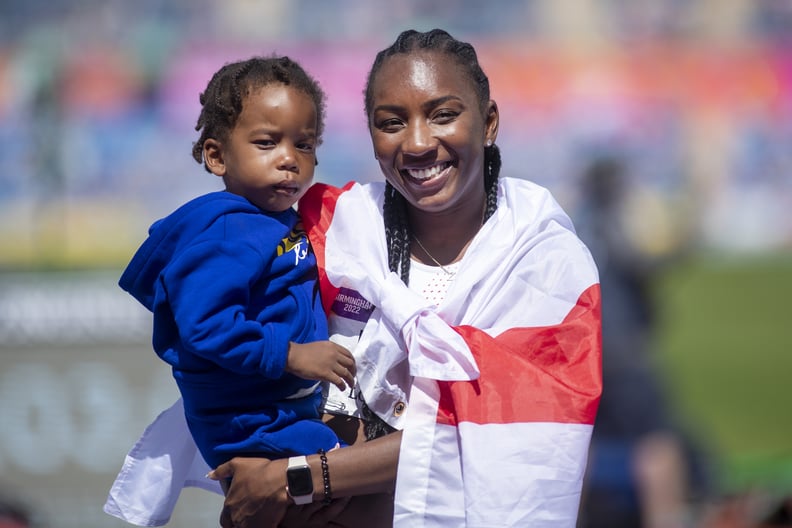 BIRMINGHAM, ENGLAND - AUGUST 7: Bianca Williams of England celebrates with her son Zuri-Li after running the third leg of her team's silver medal win in the Women's 4 x 100m Relay - Final during the Athletics competition at Alexander Stadium during the Bi