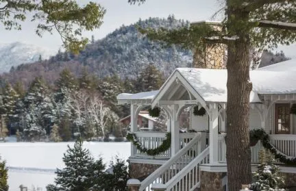 Mirror Lake Inn snowy exterior during the day in winter