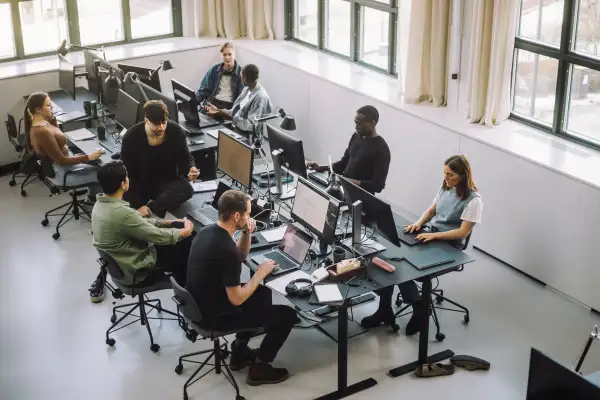 Group of workers working in an office environment