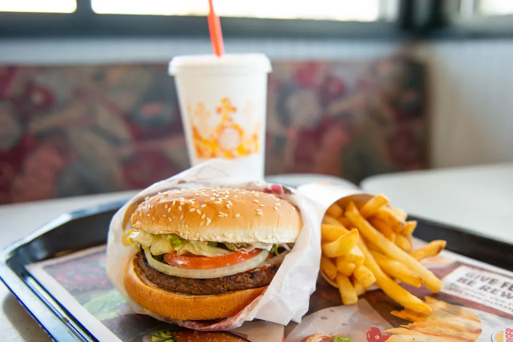 RICHMOND HEIGHTS, MO - APRIL 01: In this photo illustration, an 'Impossible Whopper' sits on a table at a Burger King restaurant on April 1, 2019 in Richmond Heights, Missouri. Burger King announced on Monday that it is testing out Impossible Whoppers, made with plant-based patties from Impossible Foods, in 59 locations in and around St. Louis area. (Photo Illustration by Michael Thomas/Getty Images)