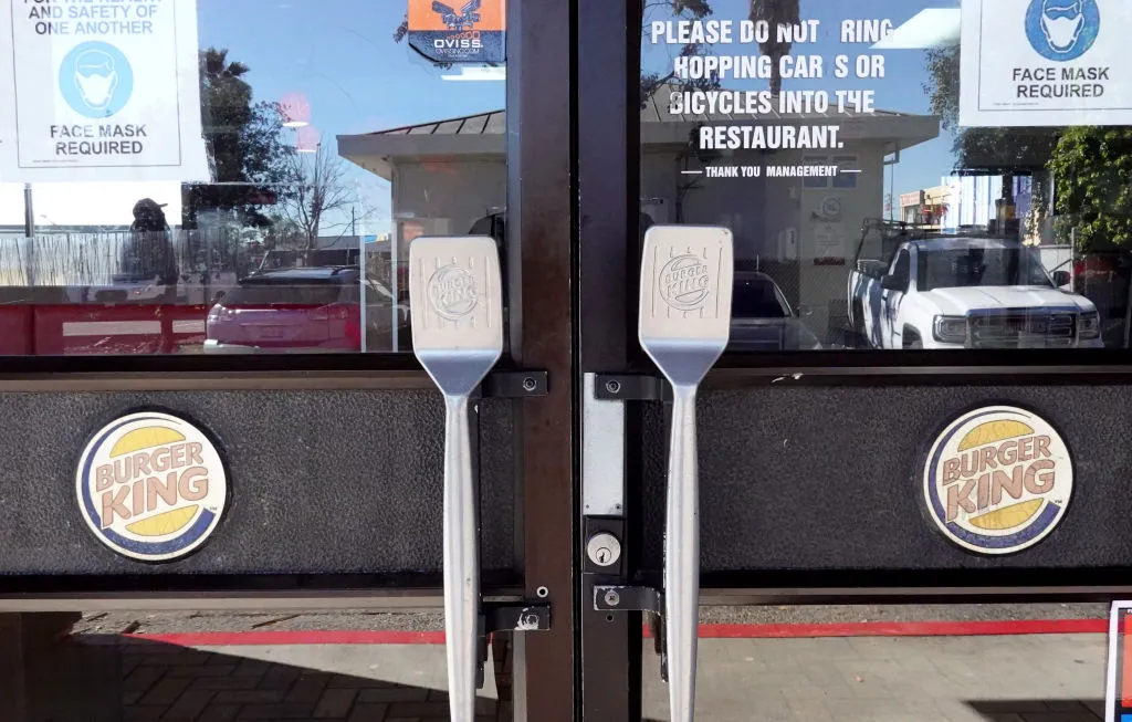 DALY CITY, CALIFORNIA - FEBRUARY 15: Spatulas serve as door handles at a Burger King restaurant on February 15, 2022 in San Rafael, California. Restaurant Brands International, the parent company of Burger King, reported strong fourth quarter earnings that beat analyst expectations with revenue of $1.55 billion. (Photo by Justin Sullivan/Getty Images)