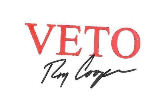 The word "VETO" and the signature of Roy Cooper
