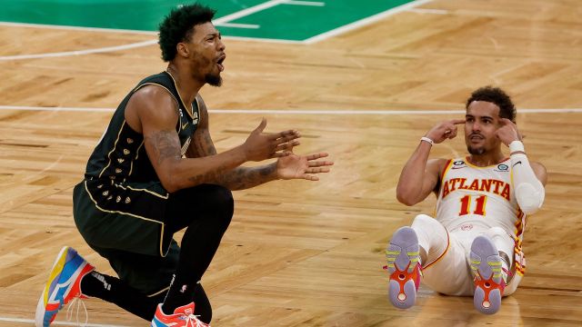 Boston Celtics guard Marcus Smart and Atlanta Hawks guard Trae Young