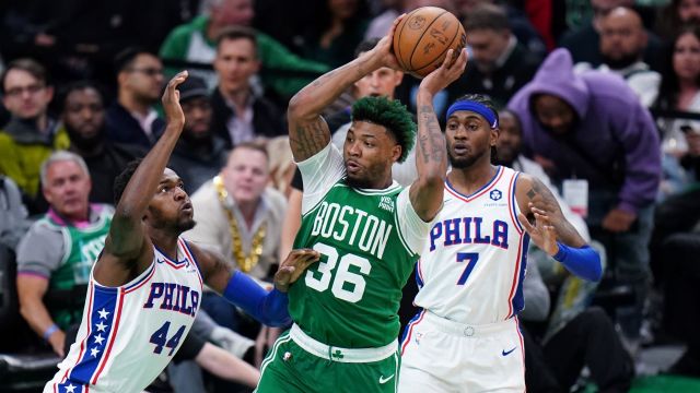 Philadelphia 76ers forward Paul Reed and Boston Celtics guard Marcus Smart