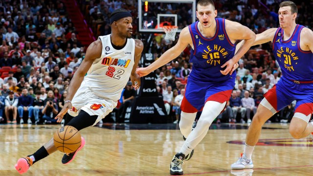 Miami Heat forward Jimmy Butler and Denver Nuggets center Nikola Jokic and and forward Vlatko Cancar