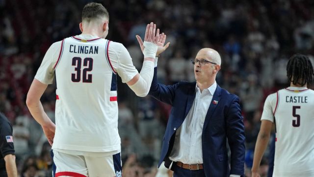 Connecticut Huskies center Donovan Clingan and head coach Dan Hurley