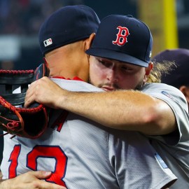 Boston Red Sox manager Alex Cora, right fielder Wilyer Abreu