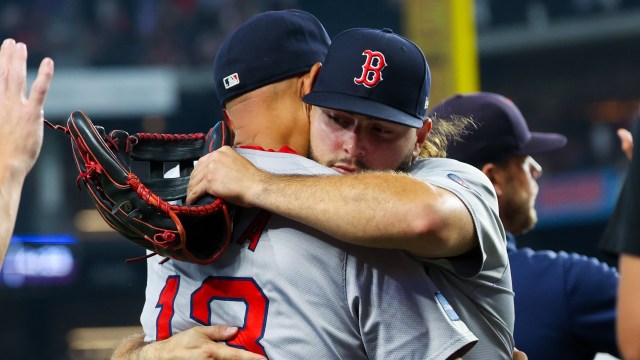 Boston Red Sox manager Alex Cora, right fielder Wilyer Abreu