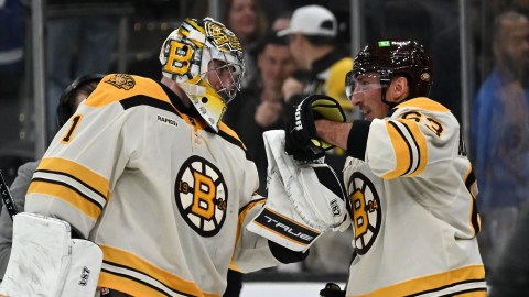 Boston Bruins goalie Jeremy Swayman, forward Brad Marchand