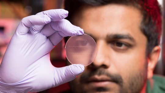 University of Chicago graduate student Ankur Agrawal worked with scientists and engineers at the University of Chicago and Fermilab on his doctoral thesis research subject, “Stimulated emission of signal photons from dark matter waves.” Photo: Reidar Hahn, Fermilab