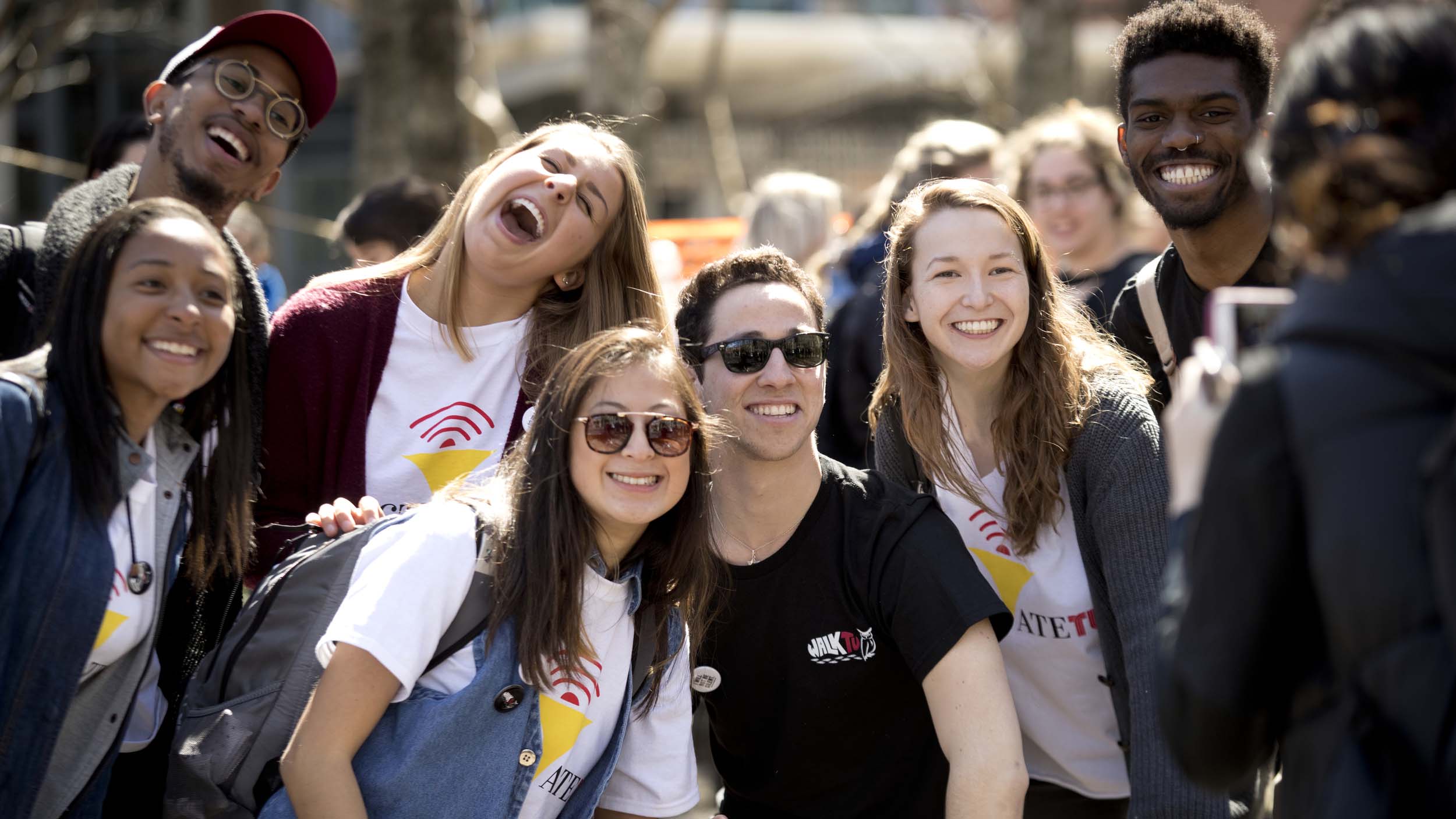 a group of students laughing together