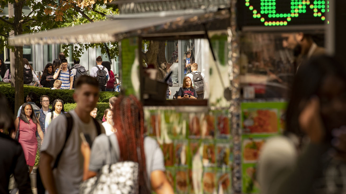 students at a food truck on campus