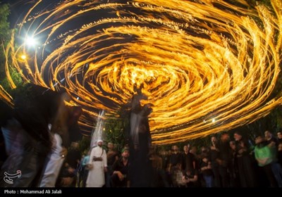 Mourners Carry Torches in Muharram