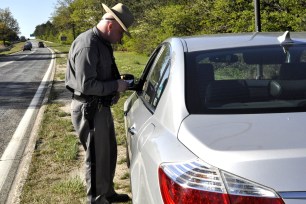 Cop issuing a ticket